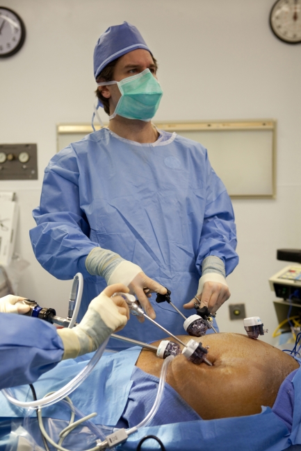 Scott Belsley, MD, FACS at operating table
